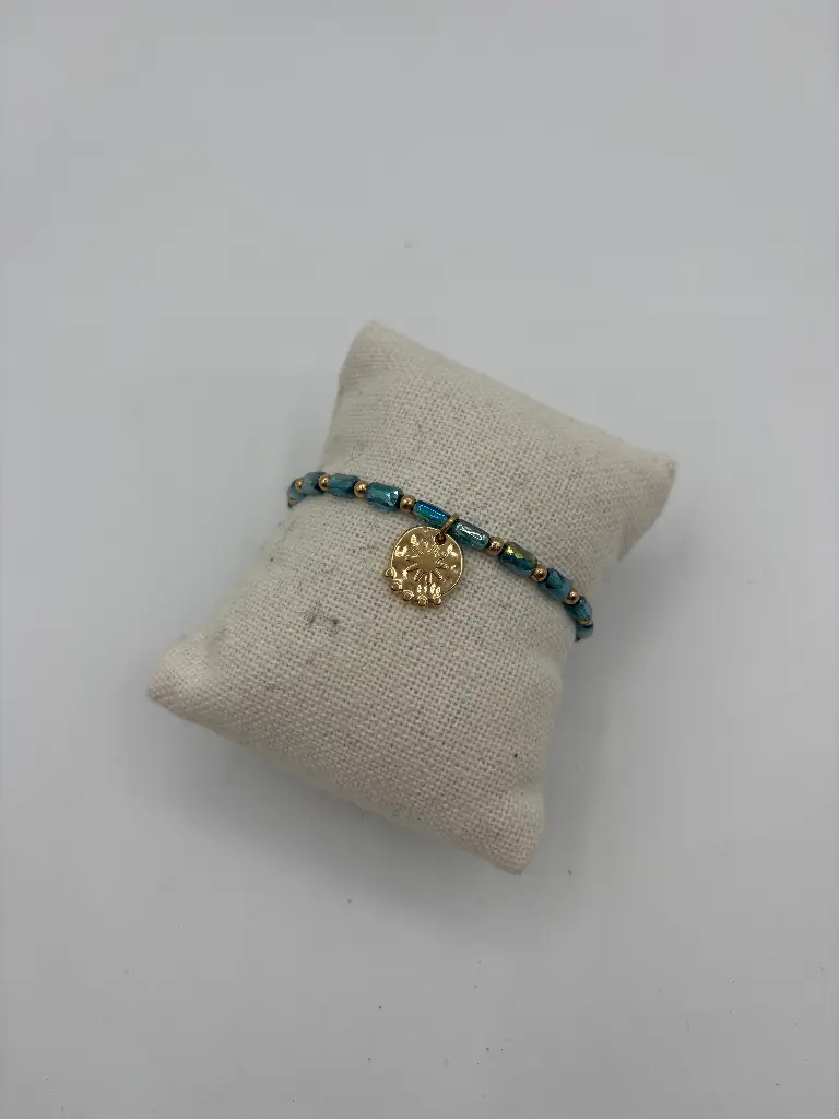 Bracelet perle pendante soleil n°243 (Bleu pétrole)