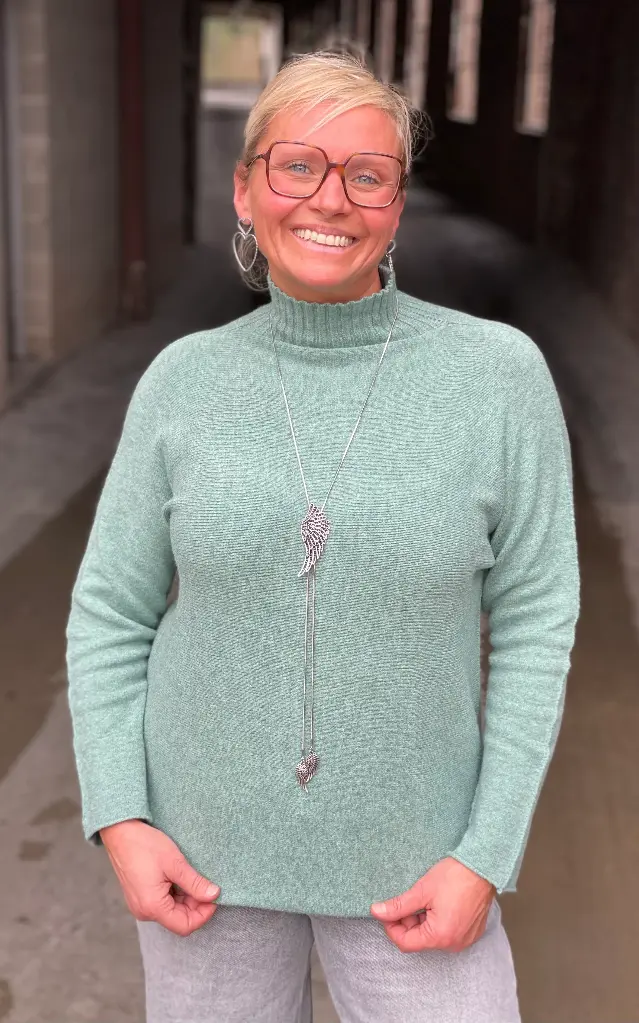 Pull coutures manches col montant